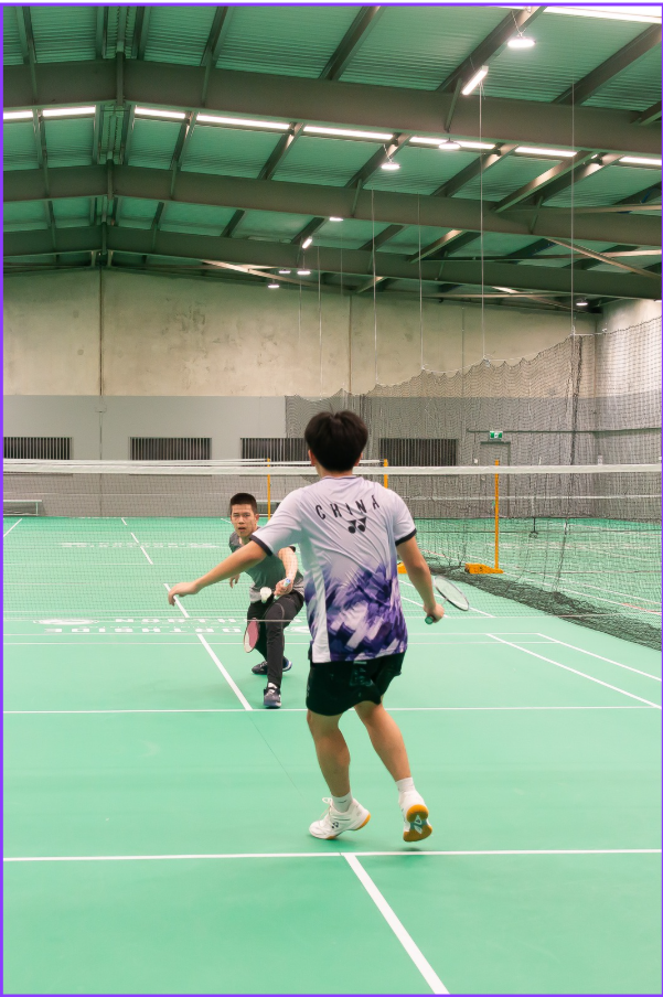 Casual badminton players on indoor courts in North Brisbane